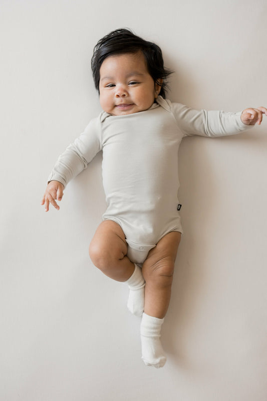 Long Sleeve Bodysuit in Oat | Kyte Baby