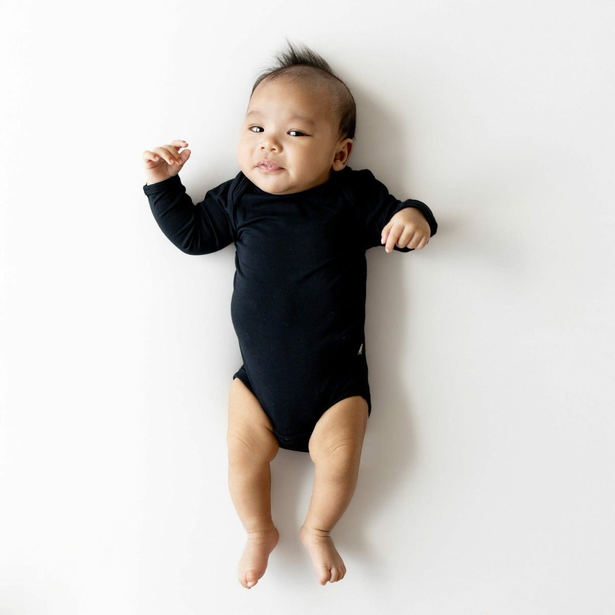 Long Sleeve Bodysuit Onesie in Midnight | Kyte Baby