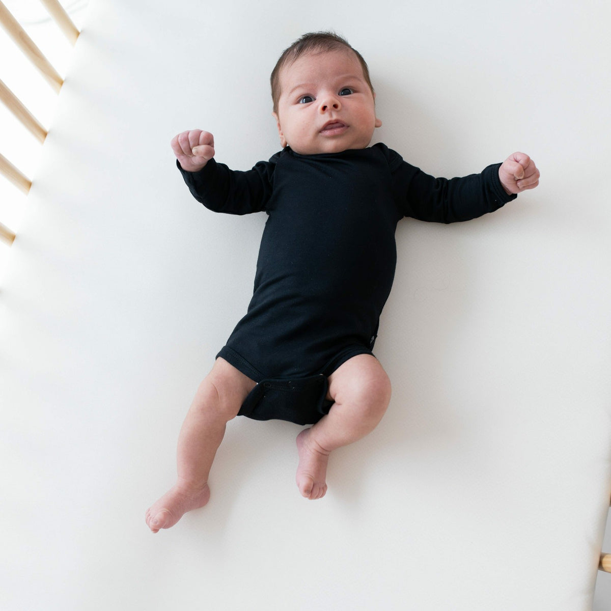 Long Sleeve Bodysuit Onesie in Midnight | Kyte Baby