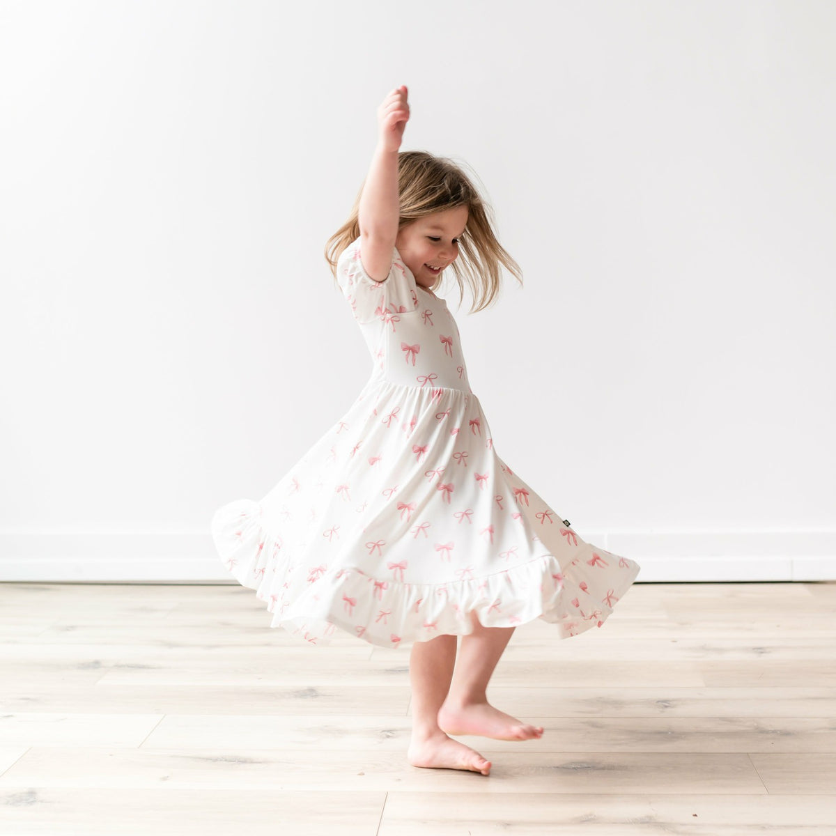 Puff Sleeve Twirl Dress in Bow | Kyte Baby