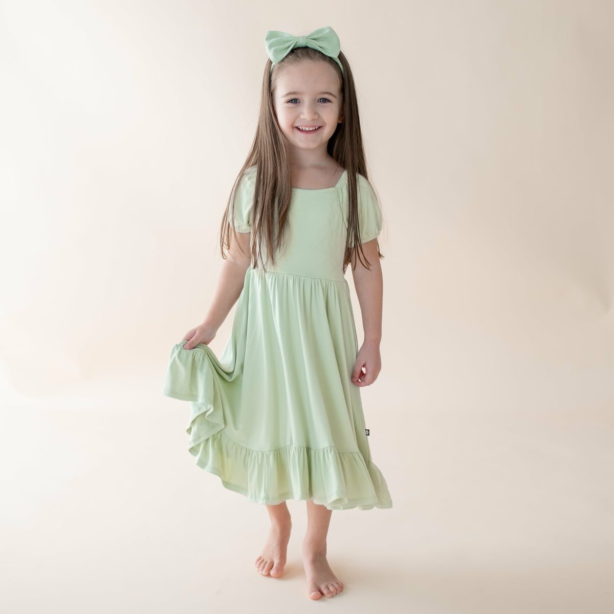 Puff Sleeve Twirl Dress in Basil | Kyte Baby