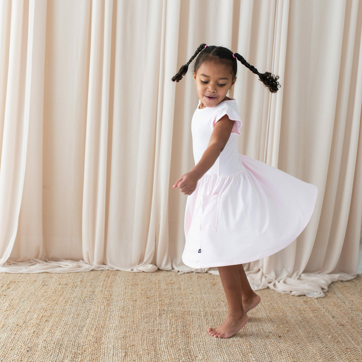 Pocket Dress in Sakura | Kyte Baby