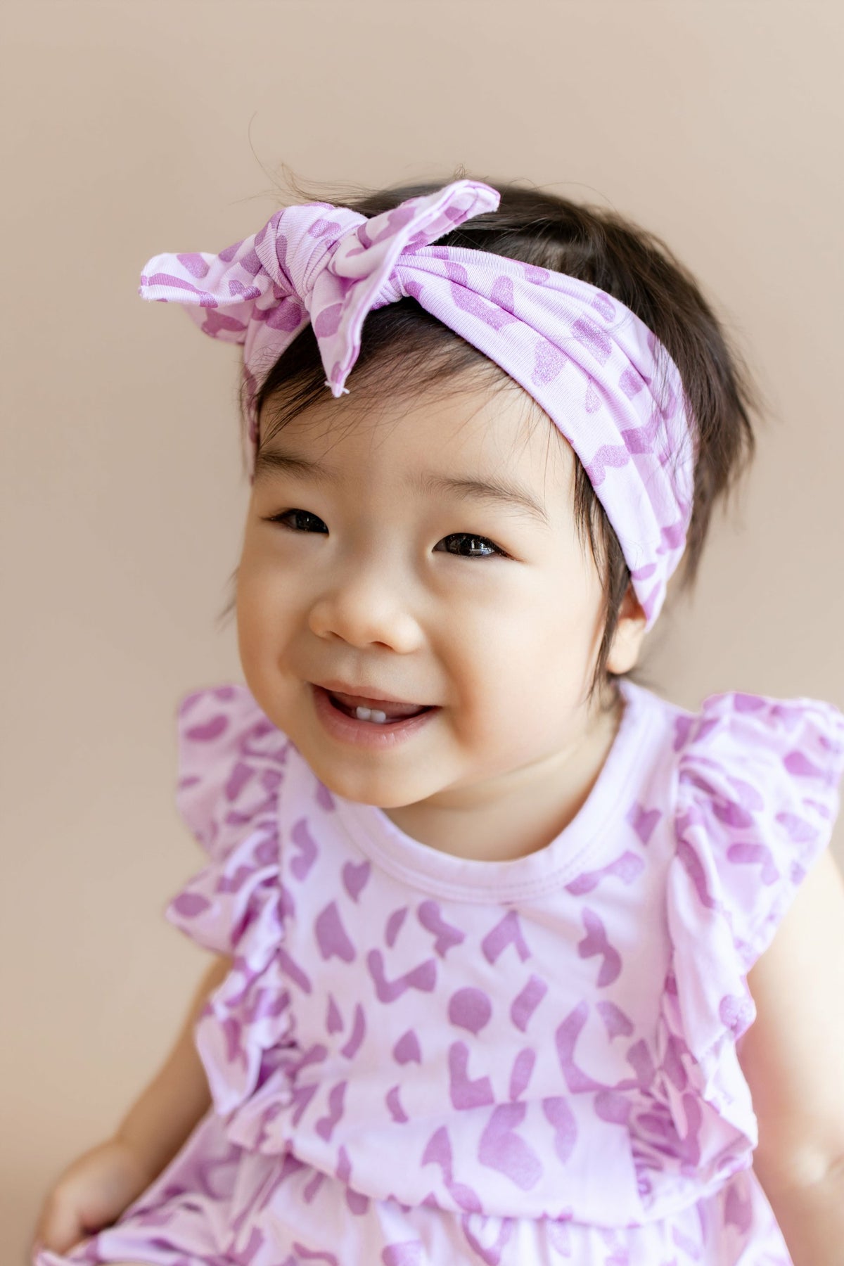 Bubble Romper in Thistle Leopard | Kyte Baby