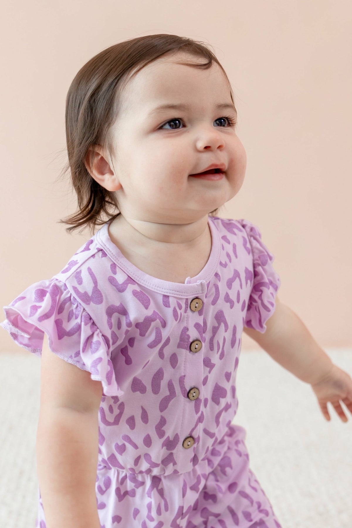 Flutter Sleeve Romper in Thistle Leopard | Kyte Baby