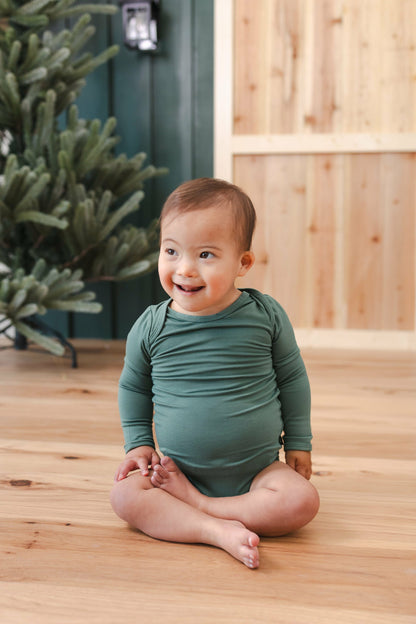 Long Sleeve Bodysuit in Pine | Kyte Baby