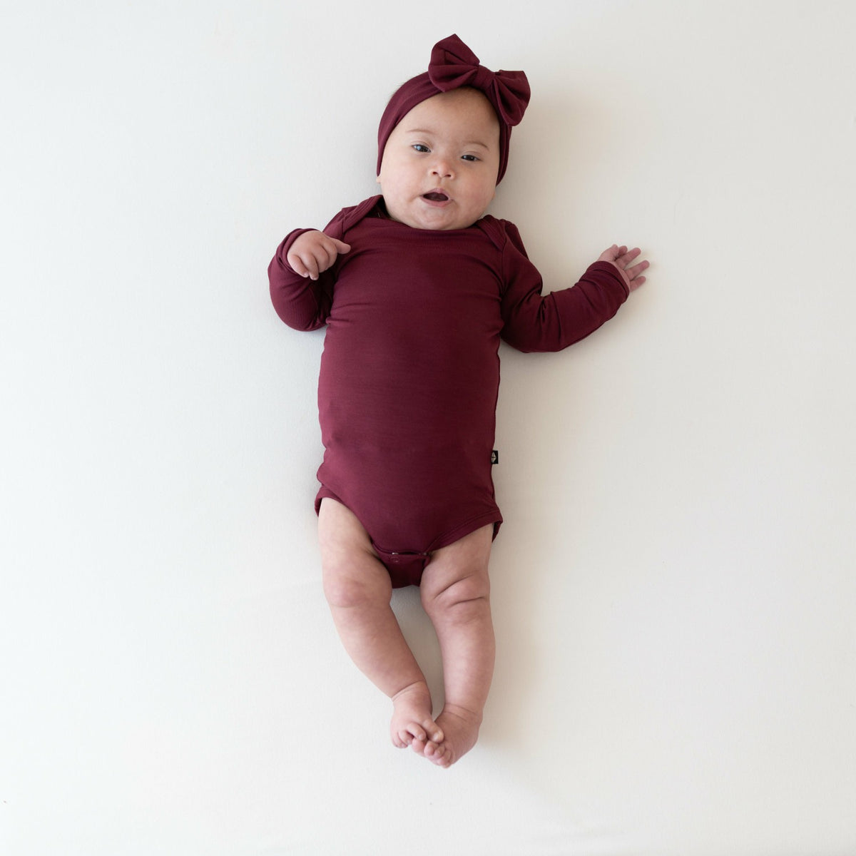 Long Sleeve Bodysuit in Burgundy | Kyte Baby