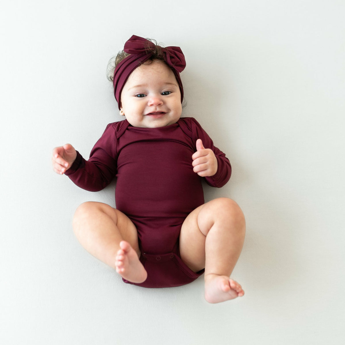 Long Sleeve Bodysuit in Burgundy | Kyte Baby