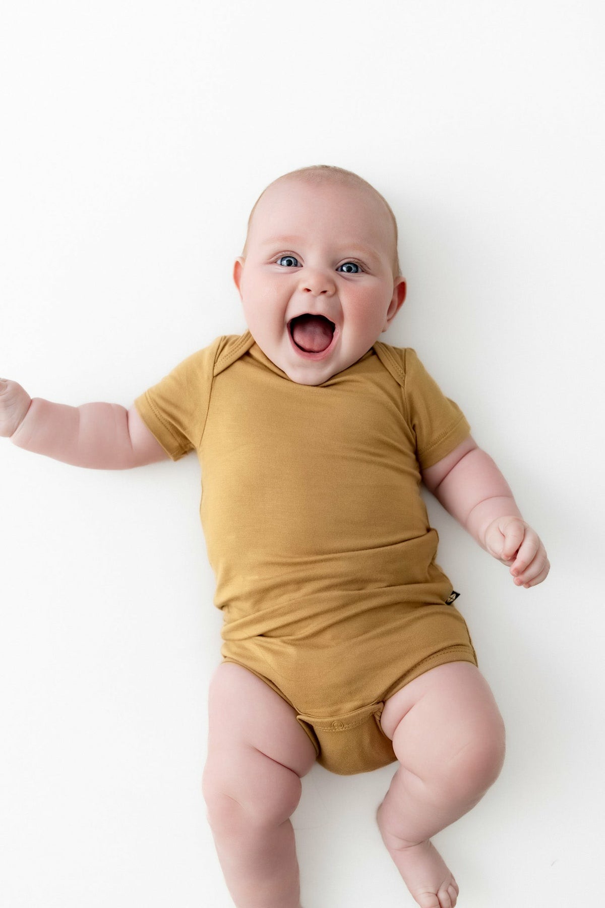 Bodysuit in Ochre | Kyte Baby