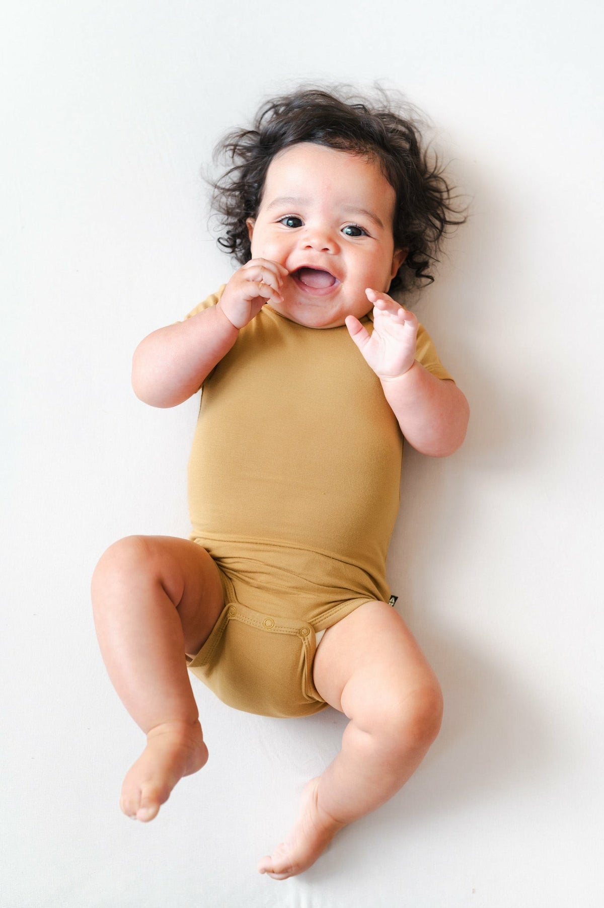 Bodysuit in Ochre | Kyte Baby