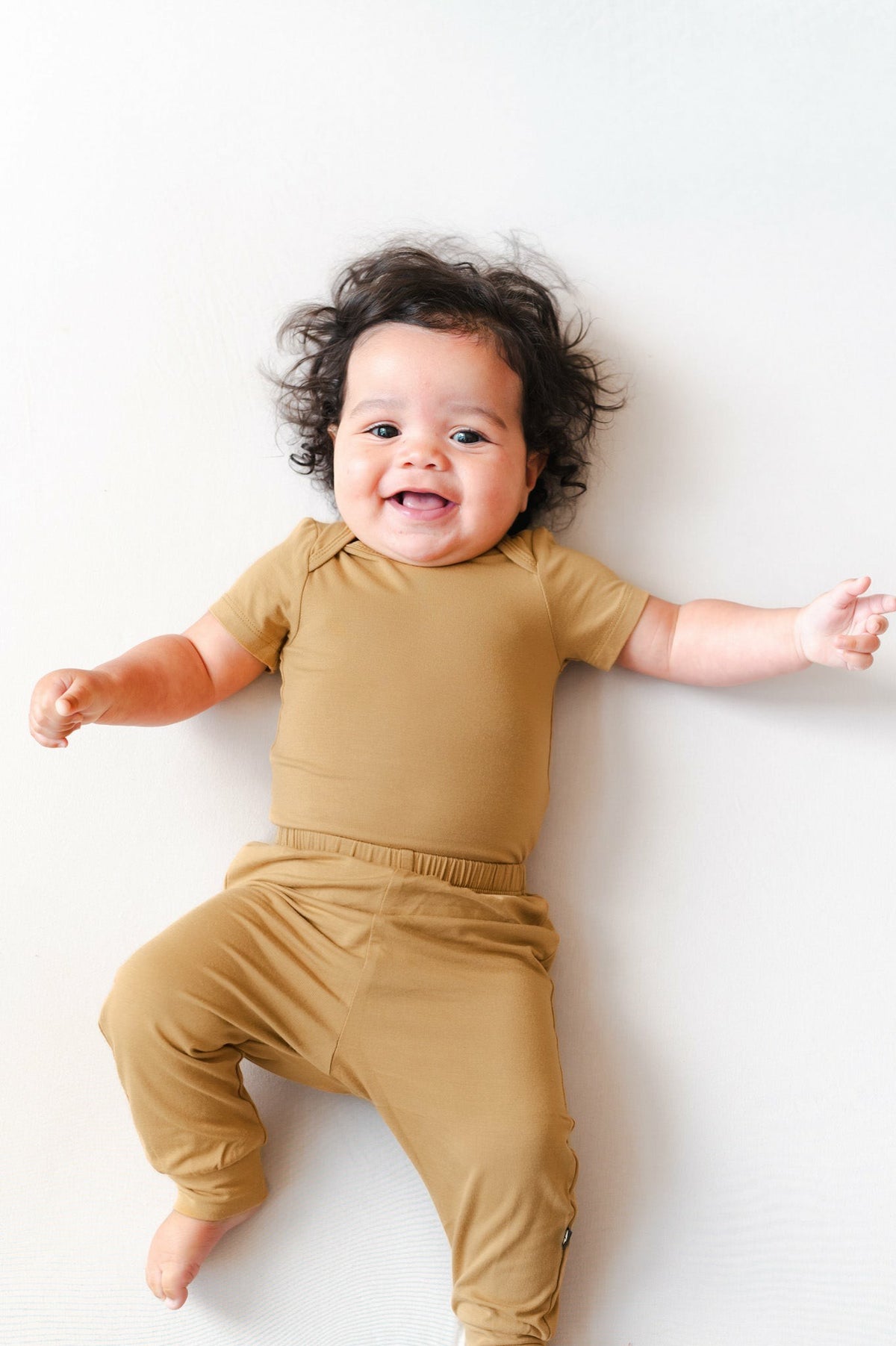 Bodysuit in Ochre | Kyte Baby